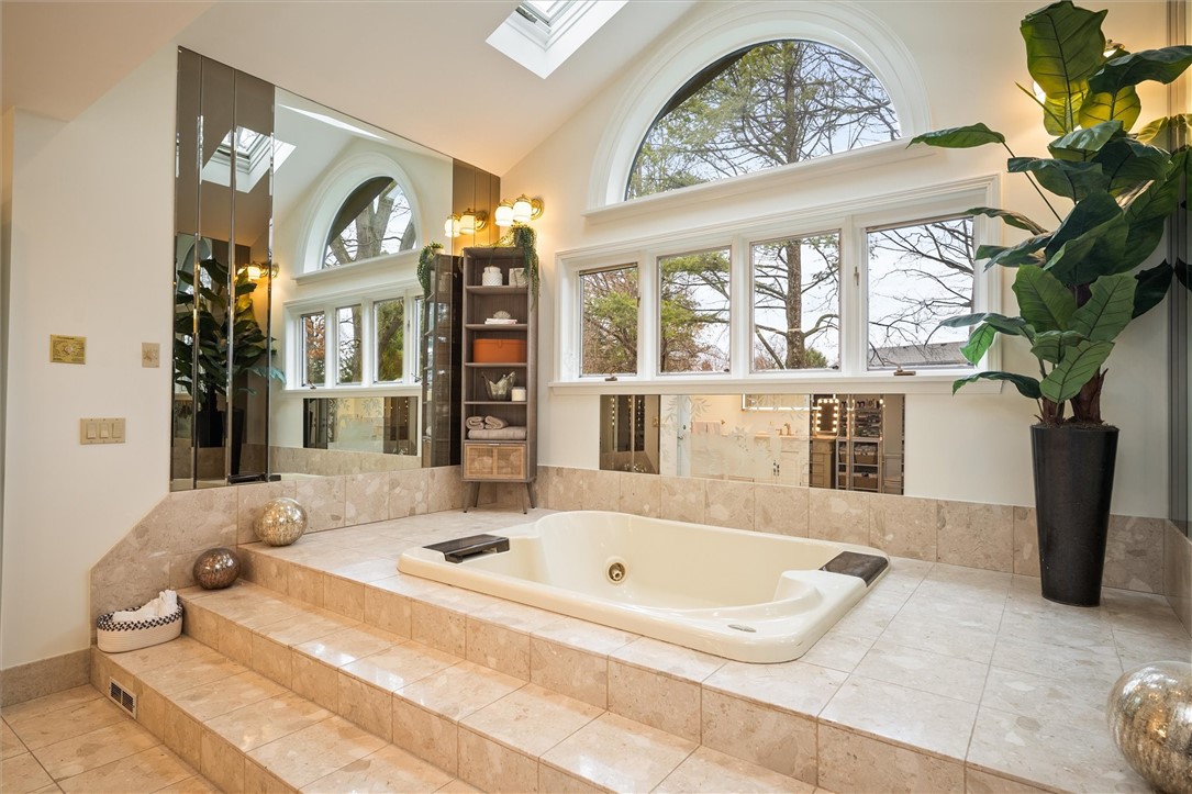 13 Shingle Mill Road Irondequoit, NY 14609 - Photo 28 of 50 Jacuzzi sunken 2-person tub with tule surround-sky