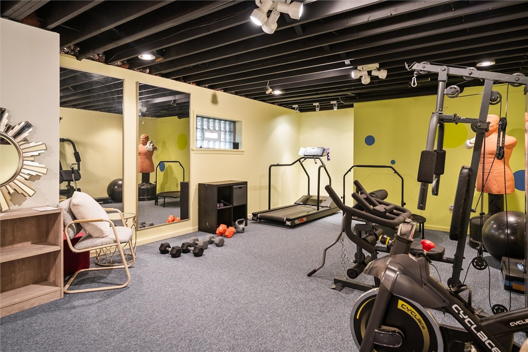 13 Shingle Mill Road Irondequoit, NY 14609 - Photo 38 of 50 Exersice room in basement-black painted ceiling an