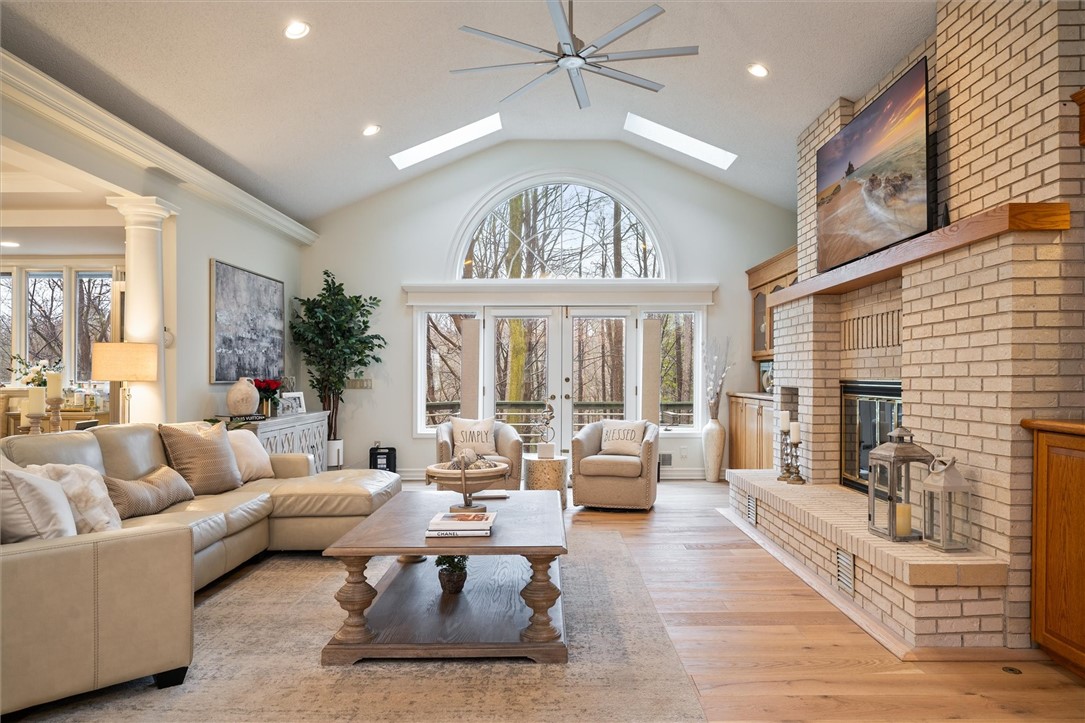 13 Shingle Mill Road Irondequoit, NY 14609 - Photo 7 of 50 Cathedral great room with skylights and French doo