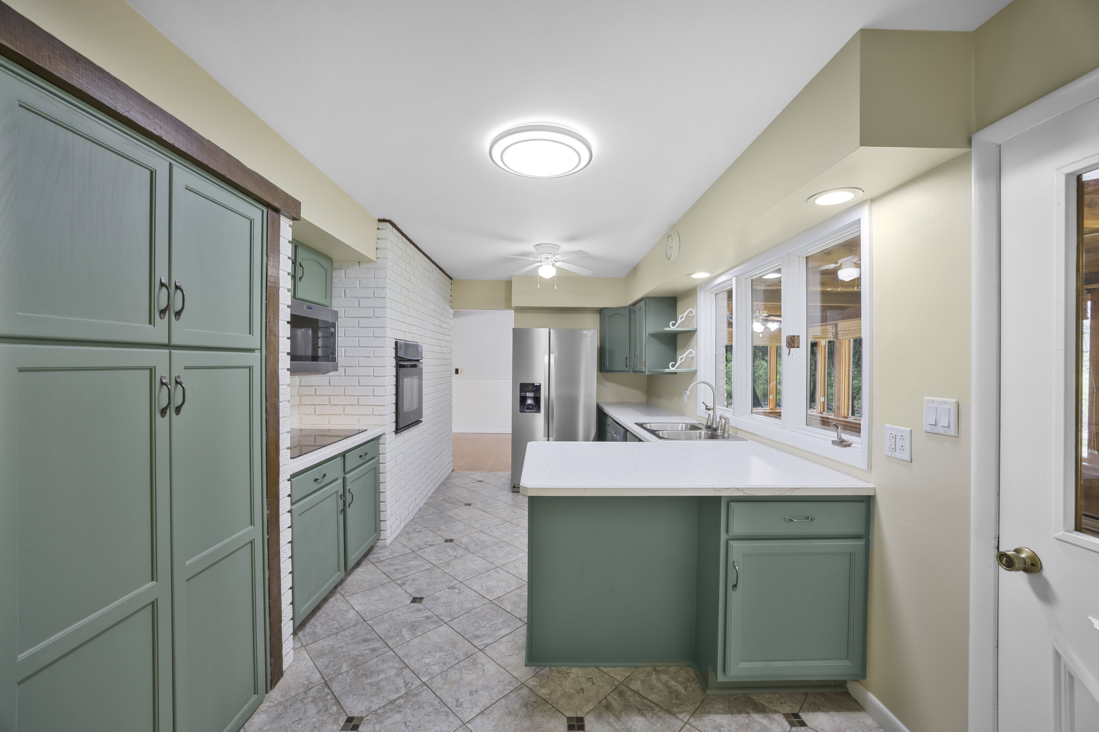 5514 North 13000th Road East Momence, IL 60954 - Photo 9 of 27 a kitchen with a sink and refrigerator