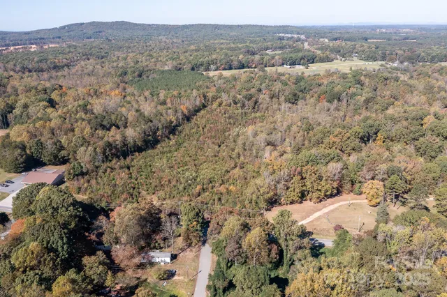 a view of a town with mountains in the background