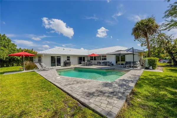 $7,000 | 409 Cypress Way East, Naples, FL 34110