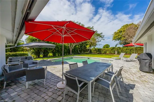 $7,000 | 409 Cypress Way East, Naples, FL 34110