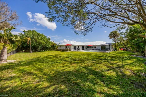 $7,000 | 409 Cypress Way East, Naples, FL 34110