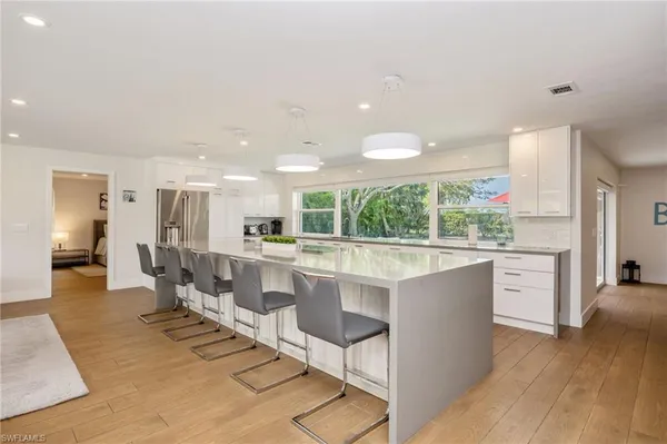 $7,000 | 409 Cypress Way East, Naples, FL 34110