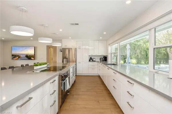 $7,000 | 409 Cypress Way East, Naples, FL 34110