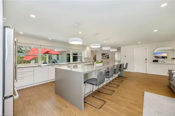 $7,000 | 409 Cypress Way East, Naples, FL 34110