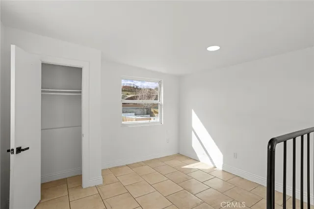 a view of entryway with stairs