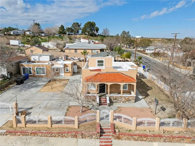 a view of a building with a yard