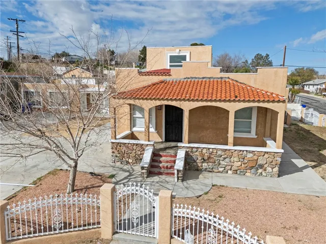 a front view of a house with stairs