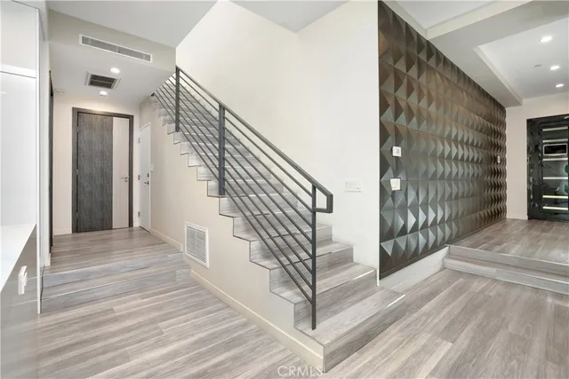 a view of entryway with wooden wall