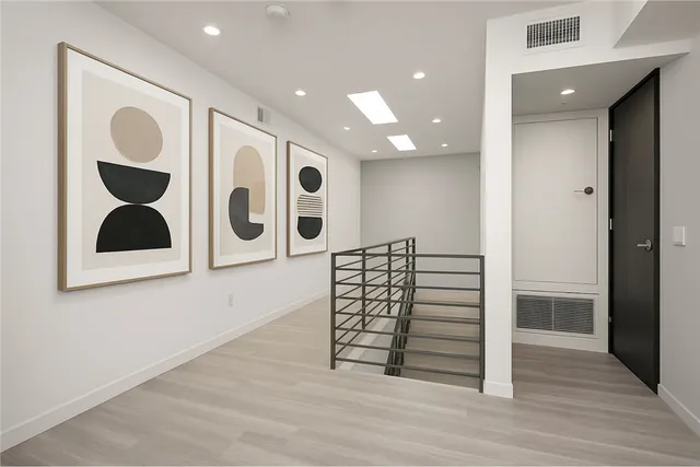 a bedroom with a bed and a flat screen television