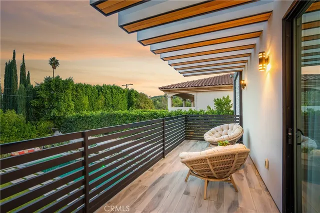 a white bath tub sitting next to a white toilet