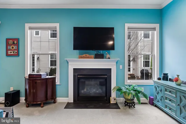 a bedroom with a bed and a fireplace