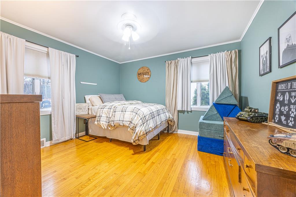 63 Evergreen Terrace Uniontown, PA 15401 - Photo 17 of 25 a spacious bedroom with a bed and a table