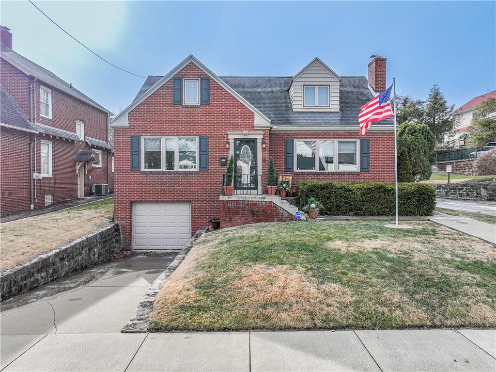 63 Evergreen Terrace Uniontown, PA 15401 - Photo 2 of 25 a front view of a house with garden