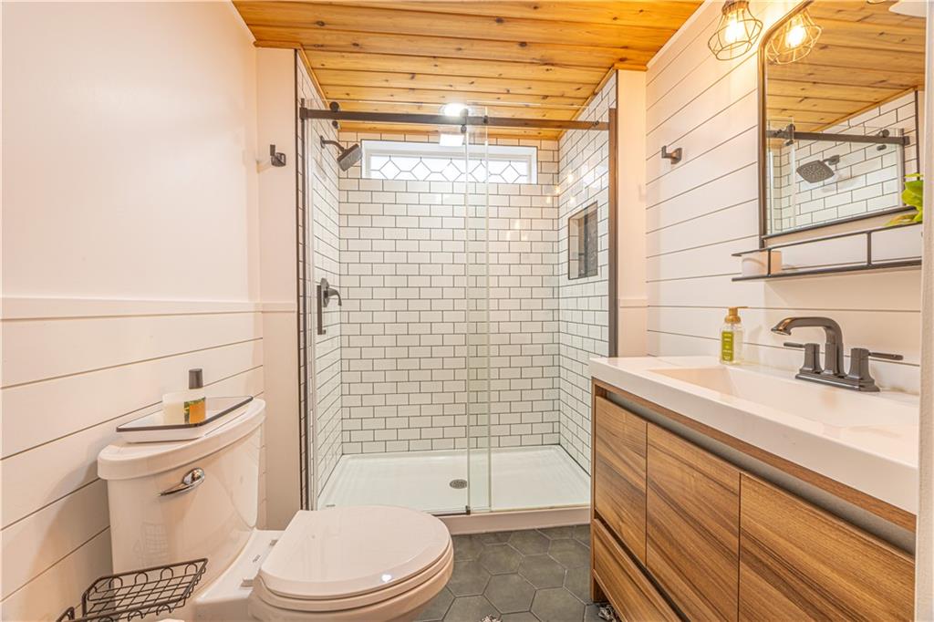 63 Evergreen Terrace Uniontown, PA 15401 - Photo 21 of 25 a bathroom with a sink a toilet and shower