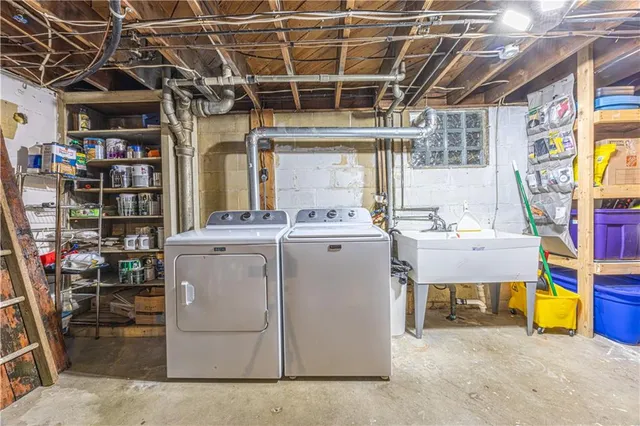 a utility room with dryer and washer