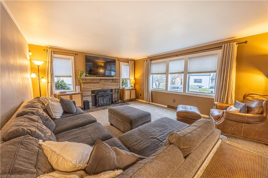 63 Evergreen Terrace Uniontown, PA 15401 - Photo 5 of 25 a living room with fireplace furniture and a window