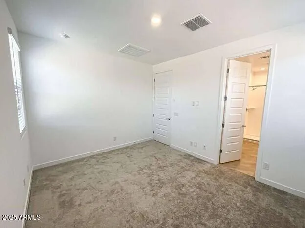 an empty room with closet