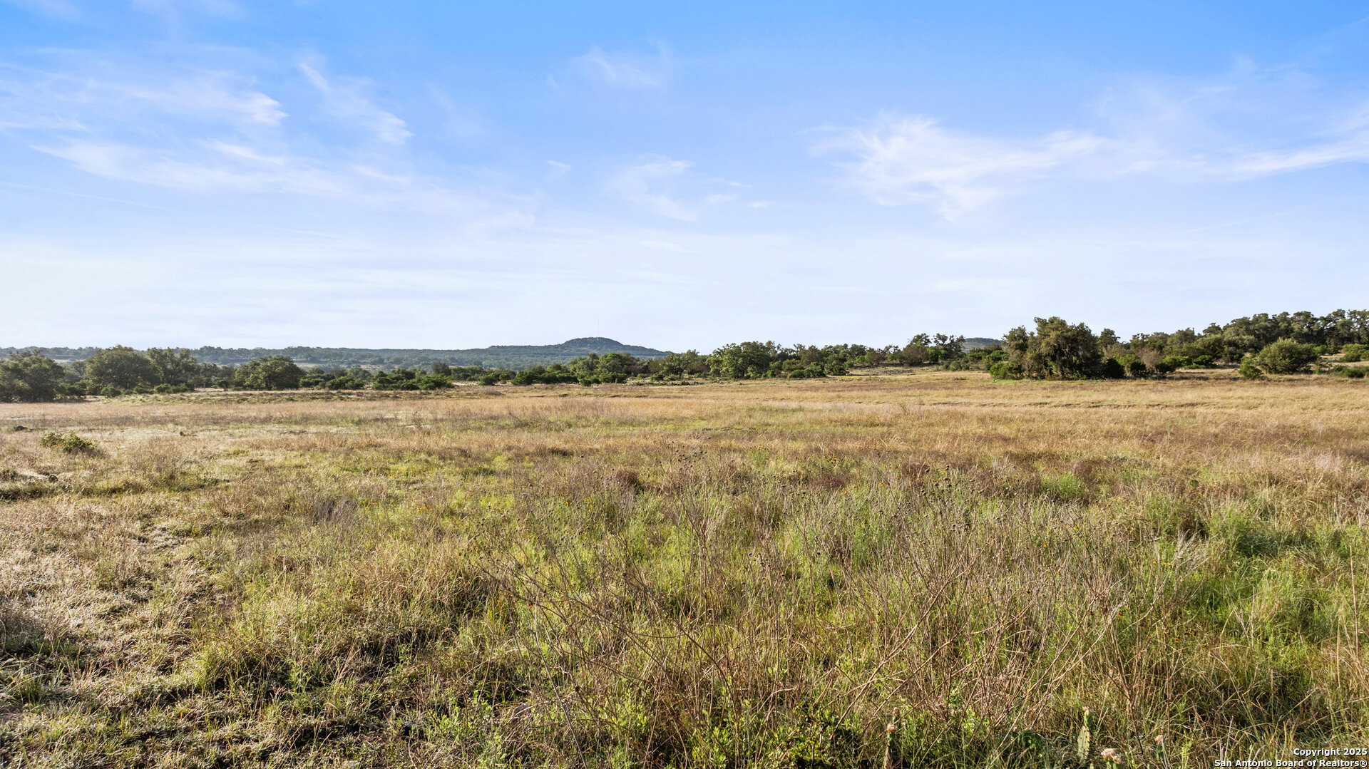 Lot 3 Vista Ridge Round Mountain, TX 78663 - Photo 9 of 19 a view of a lake with houses in the back