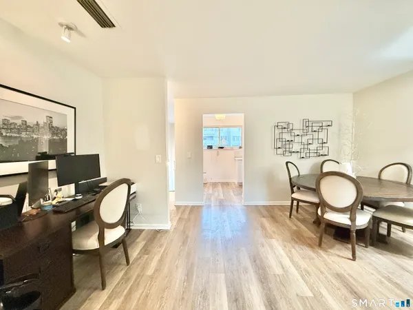 a workspace with wooden floor