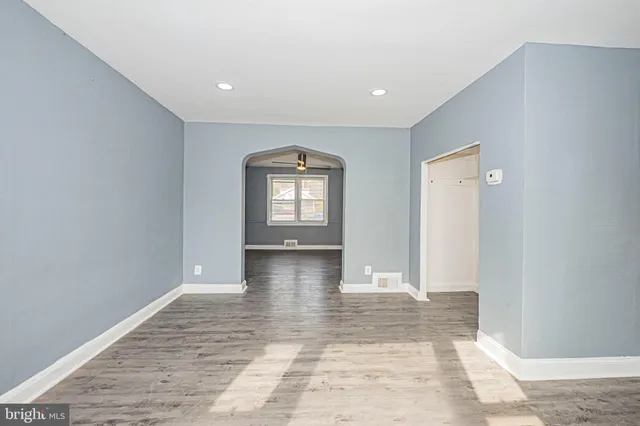 a view of livingroom with window and hardwood floor