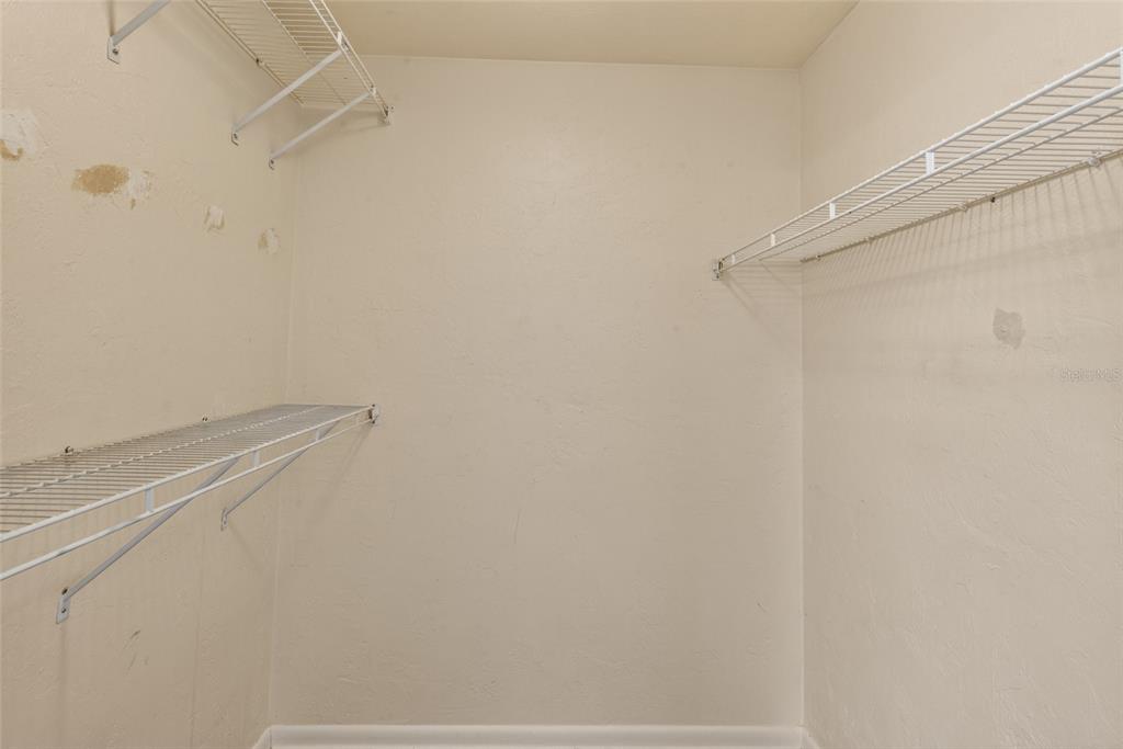 2116 Southwest 39 Drive Gainesville, FL 32607 - Photo 17 of 28 a view of a room with racks on the wall