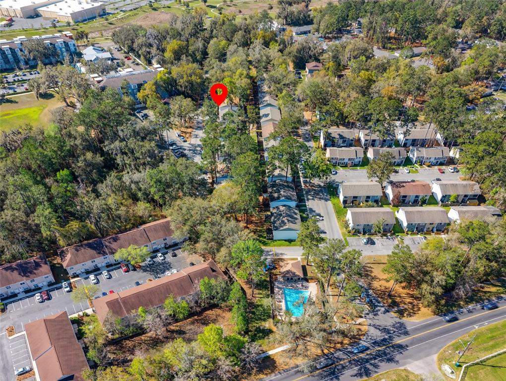 2116 Southwest 39 Drive Gainesville, FL 32607 - Photo 26 of 28 an aerial view of residential houses with outdoor space and swimming pool