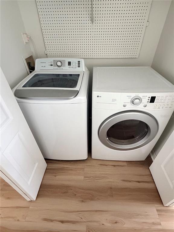 2651 Graduate Court Orlando, FL 32826 - Photo 13 of 13 a utility room with dryer and washer