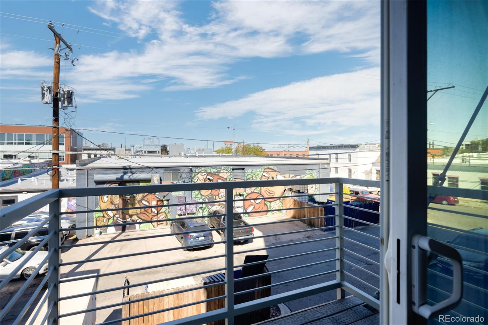 2999 Lawrence Street, Unit 202 Denver, CO 80205 - Photo 15 of 40 a view of a balcony with city view