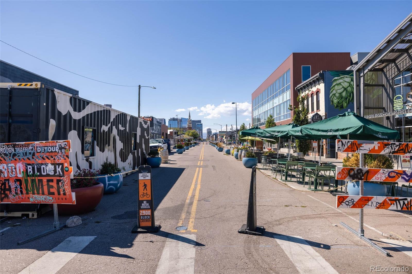 2999 Lawrence Street, Unit 202 Denver, CO 80205 - Photo 29 of 40 a view of street with sitting area