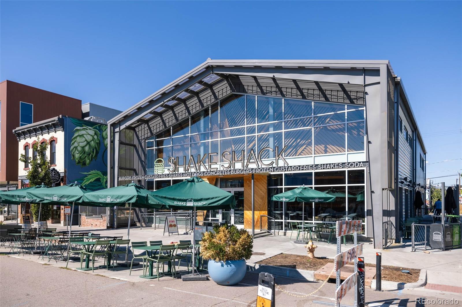 2999 Lawrence Street, Unit 202 Denver, CO 80205 - Photo 30 of 40 a front view of a building with street view