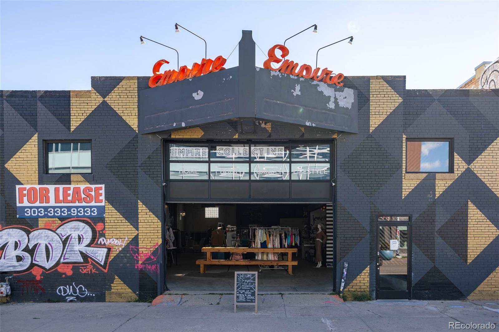 2999 Lawrence Street, Unit 202 Denver, CO 80205 - Photo 31 of 40 a view of a chairs and tables in patio