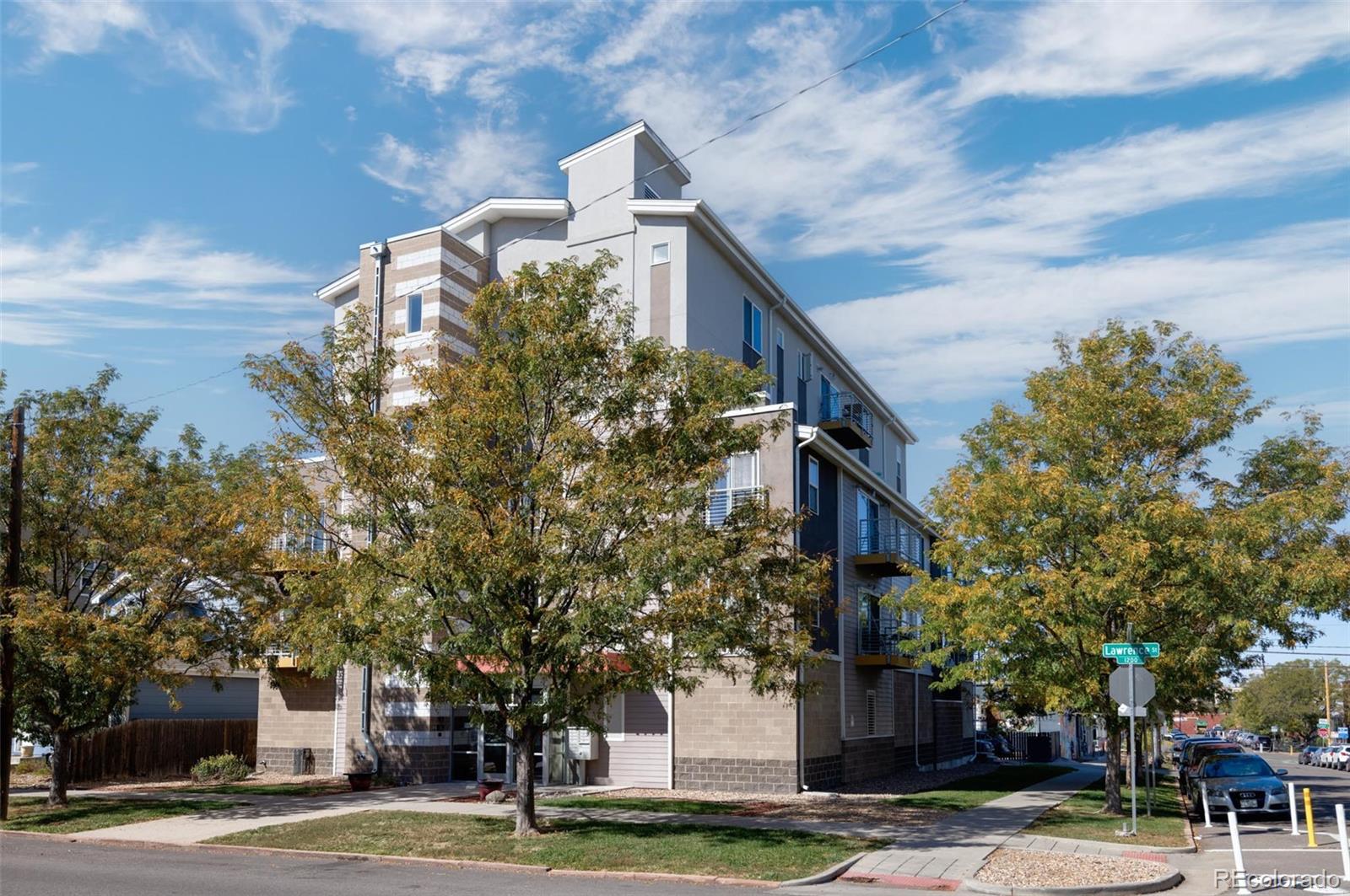 2999 Lawrence Street, Unit 202 Denver, CO 80205 - Photo 4 of 40 a view of a city with tall building