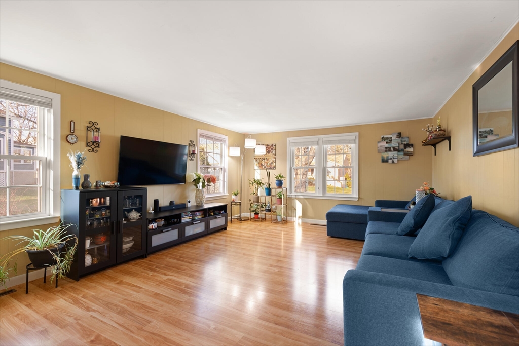 11 Hoover Road Walpole, MA 02081 - Photo 12 of 39 a living room with furniture and a flat screen tv