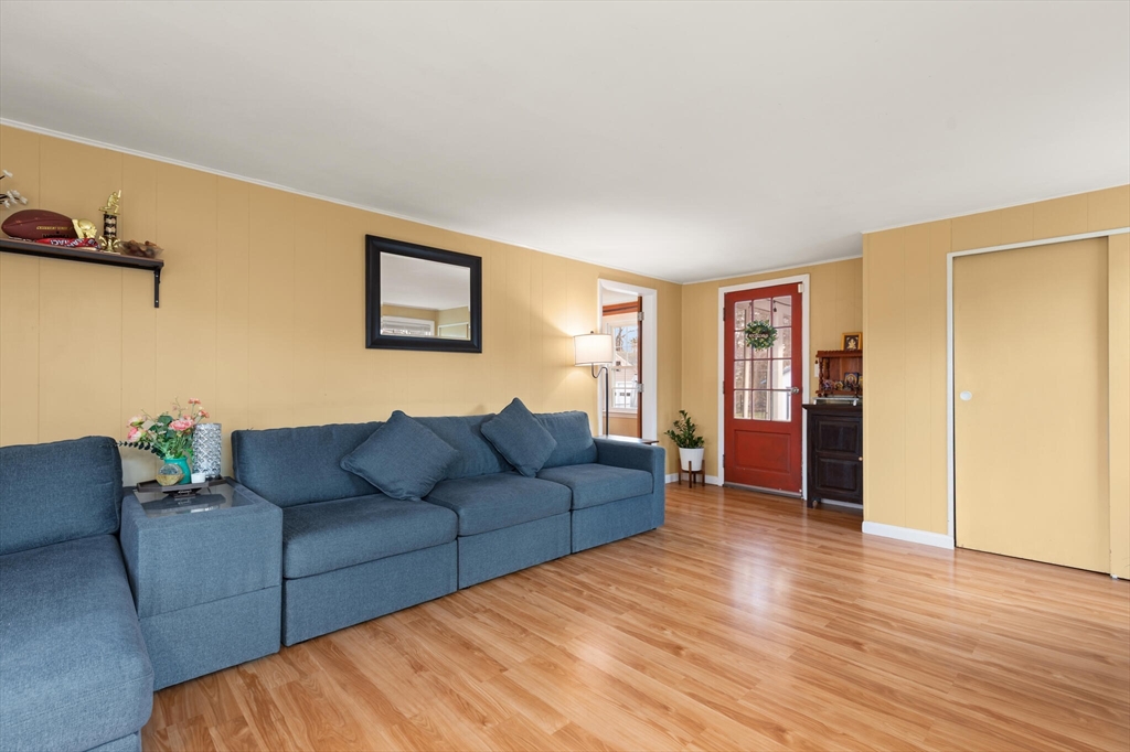 11 Hoover Road Walpole, MA 02081 - Photo 13 of 39 a living room with furniture and a wooden floor