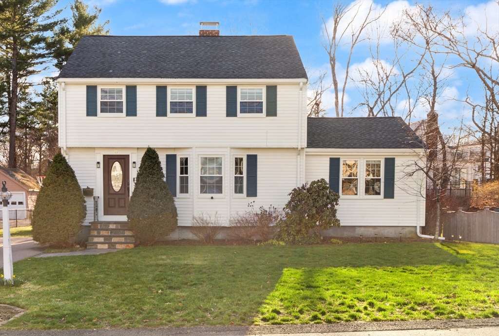 11 Hoover Road Walpole, MA 02081 - Photo 2 of 39 a front view of a house with a yard