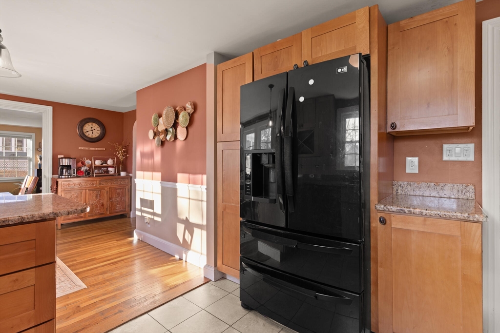 11 Hoover Road Walpole, MA 02081 - Photo 21 of 39 a kitchen with a refrigerator and a stove top oven