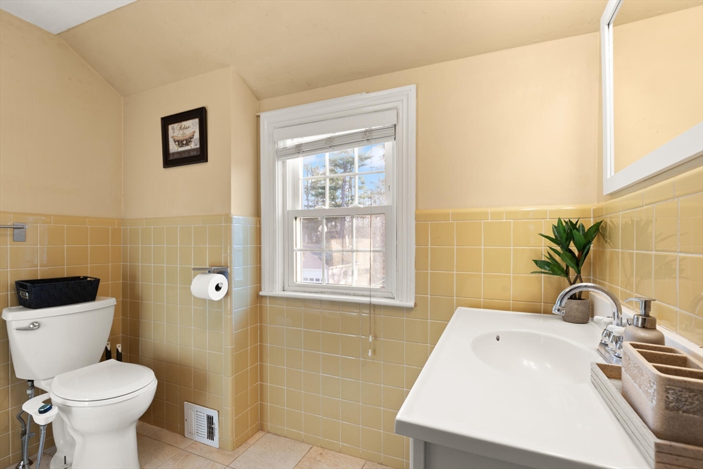 11 Hoover Road Walpole, MA 02081 - Photo 27 of 39 a bathroom with a sink a toilet and tub