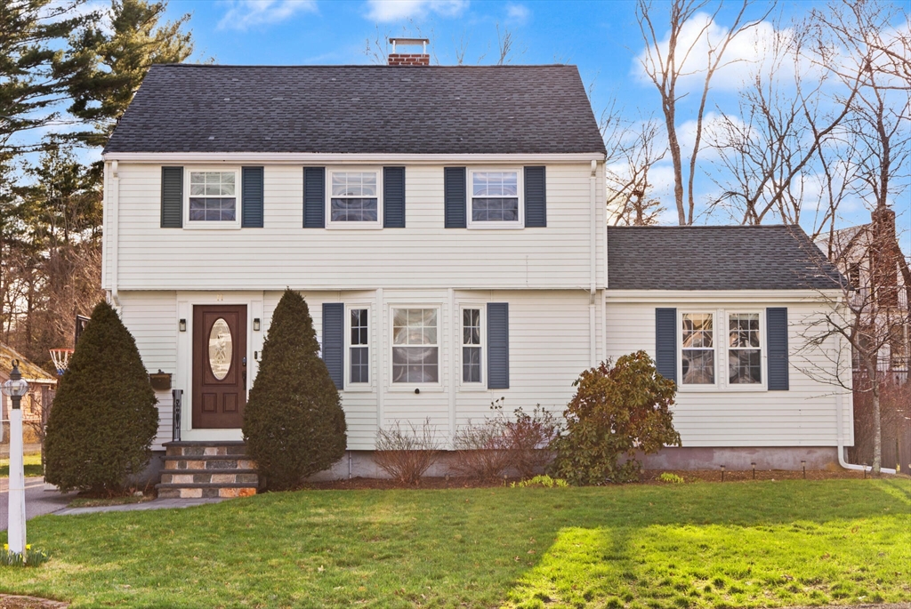 11 Hoover Road Walpole, MA 02081 - Photo 3 of 39 front view of a house with a yard