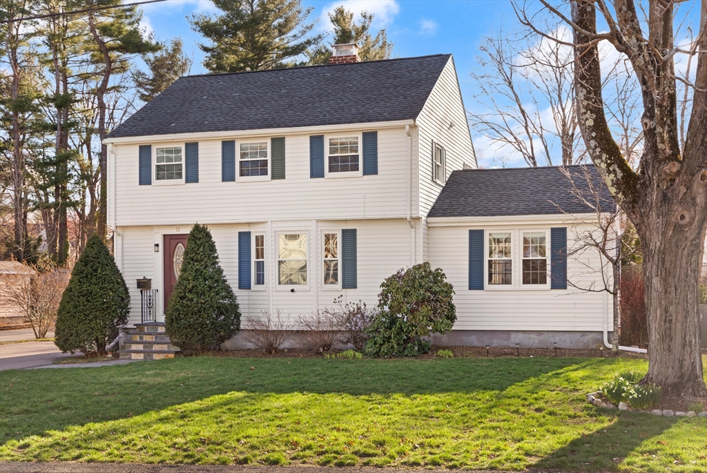 11 Hoover Road Walpole, MA 02081 - Photo 5 of 39 a front view of a house with a yard