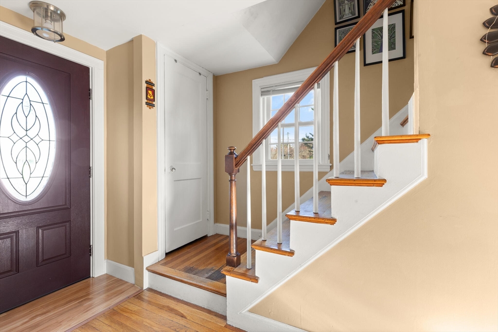 11 Hoover Road Walpole, MA 02081 - Photo 7 of 39 a view of staircase with wooden floor and staircase