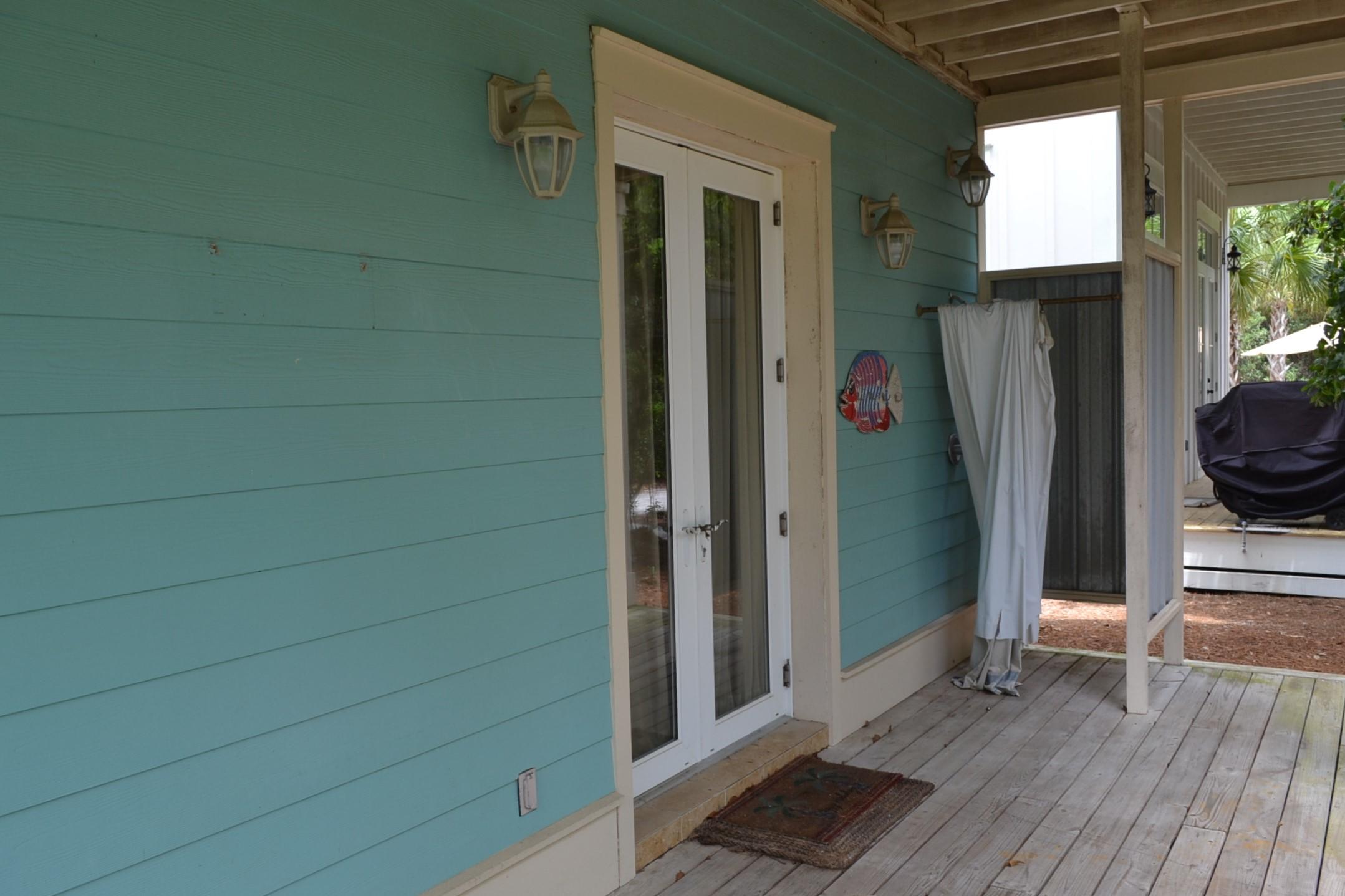 77 Lifeguard Loop East Seacrest, FL 32461 - Photo 21 of 32 Back porch with outdoor shower
