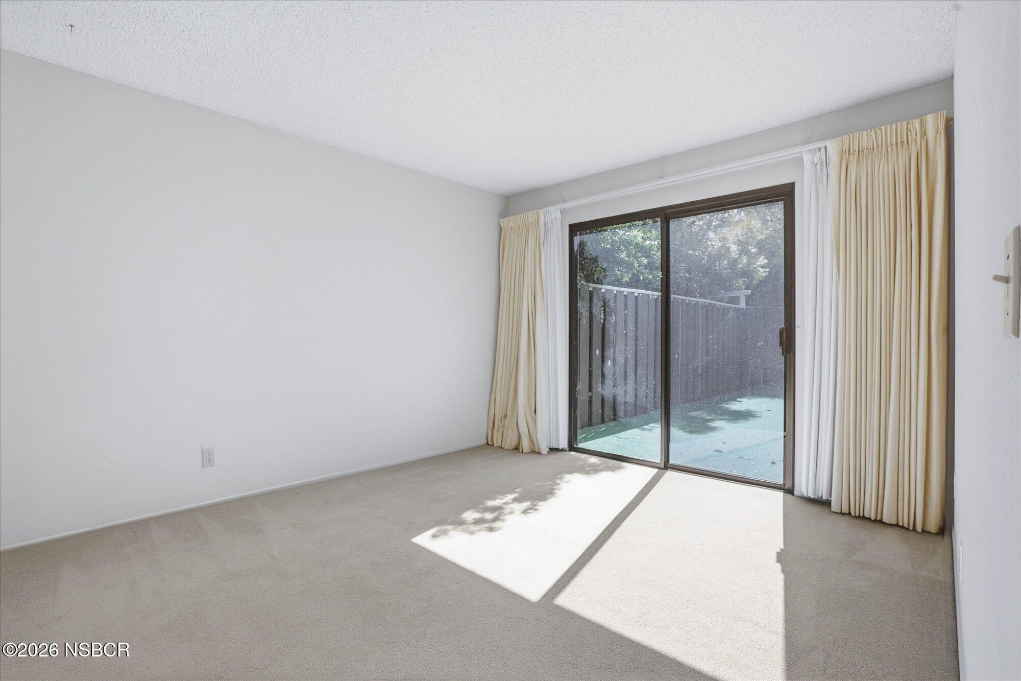 166 Tallyho Road Santa Maria, CA 93455 - Photo 16 of 20 a view of an empty room and window
