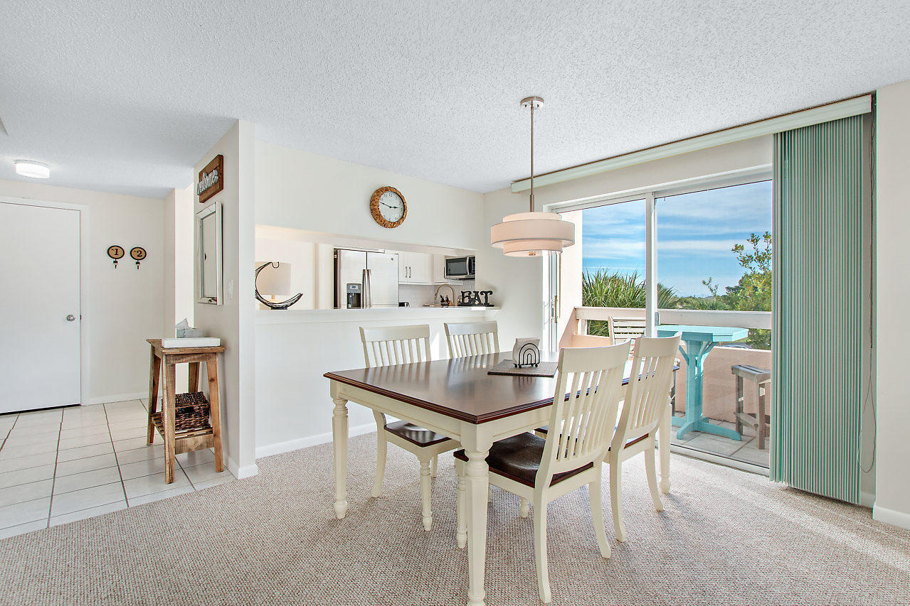 353 Highway 1, Unit B301 Jupiter, FL 33477 - Photo 16 of 58 a view of a dining room with furniture window and outside view