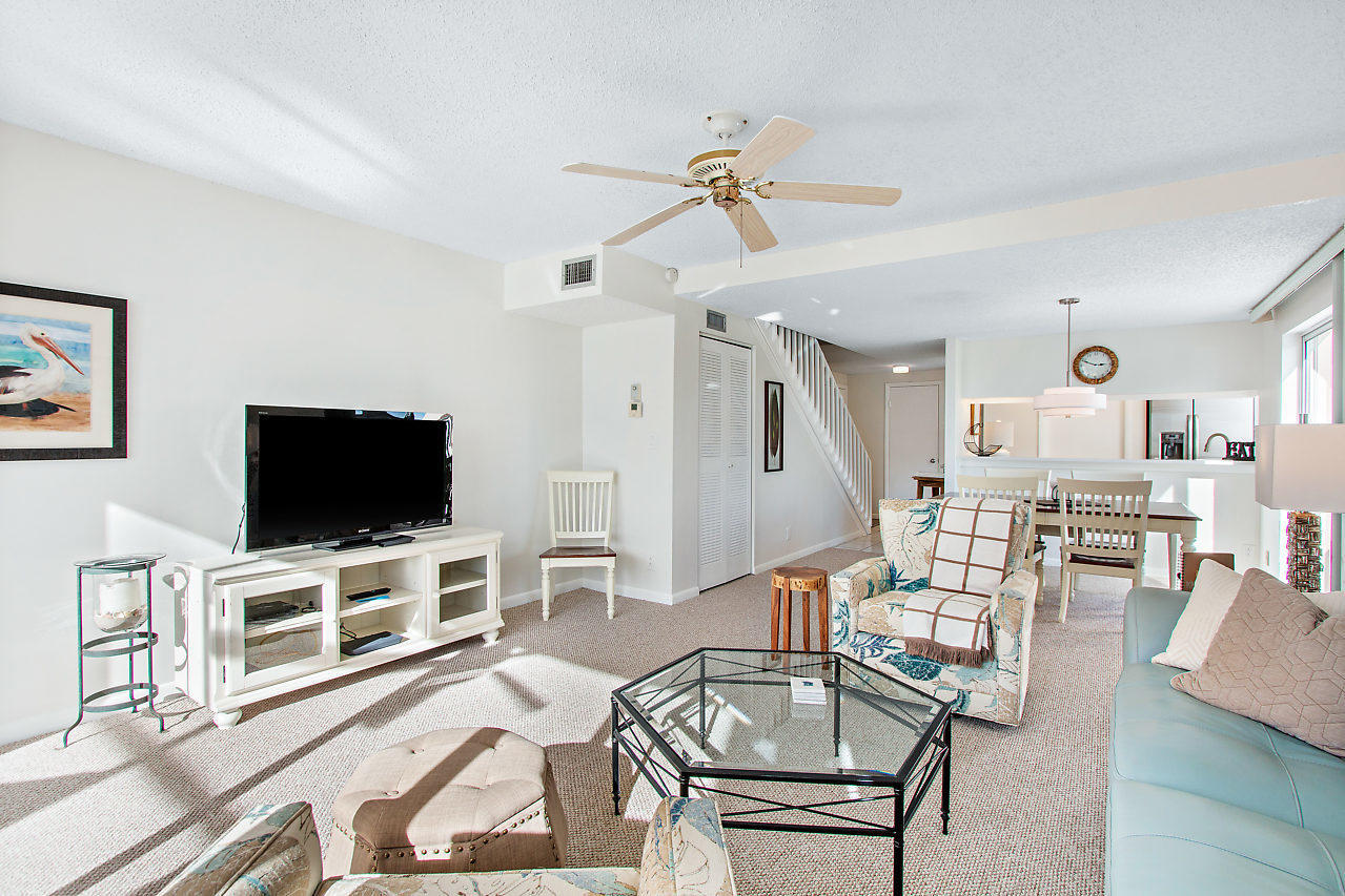 353 Highway 1, Unit B301 Jupiter, FL 33477 - Photo 19 of 58 a living room with furniture and a flat screen tv