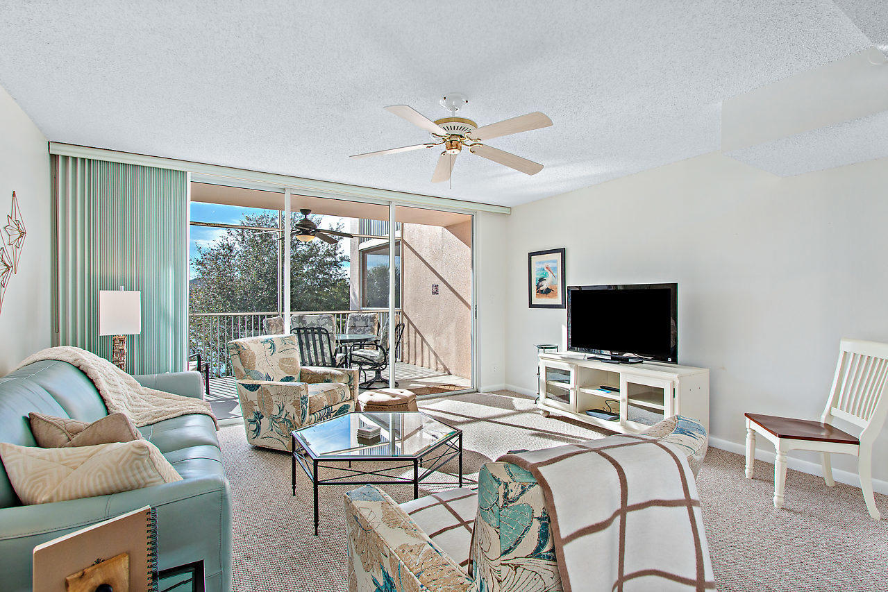 353 Highway 1, Unit B301 Jupiter, FL 33477 - Photo 20 of 58 a bedroom with furniture and a flat screen tv