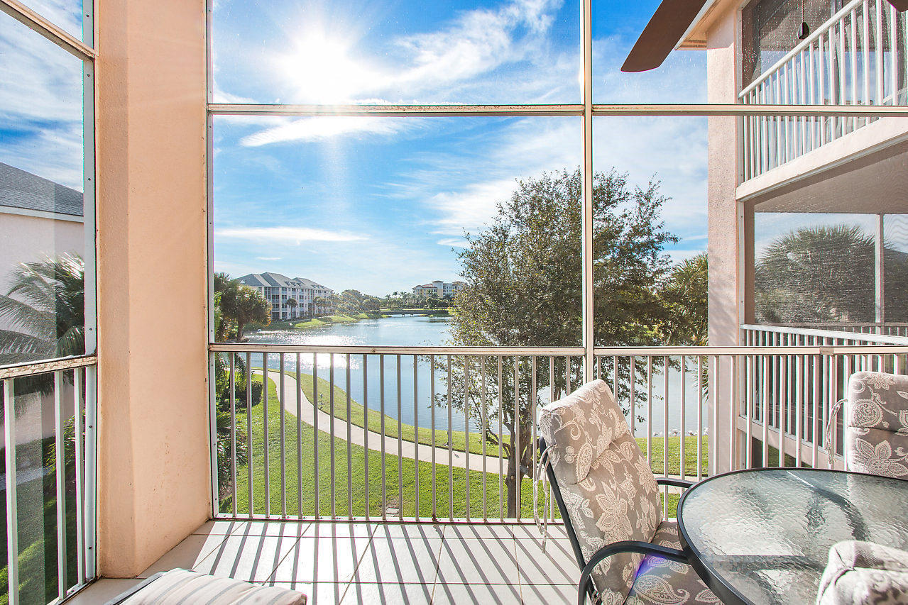 353 Highway 1, Unit B301 Jupiter, FL 33477 - Photo 32 of 58 a view of a balcony with chair and wooden floor