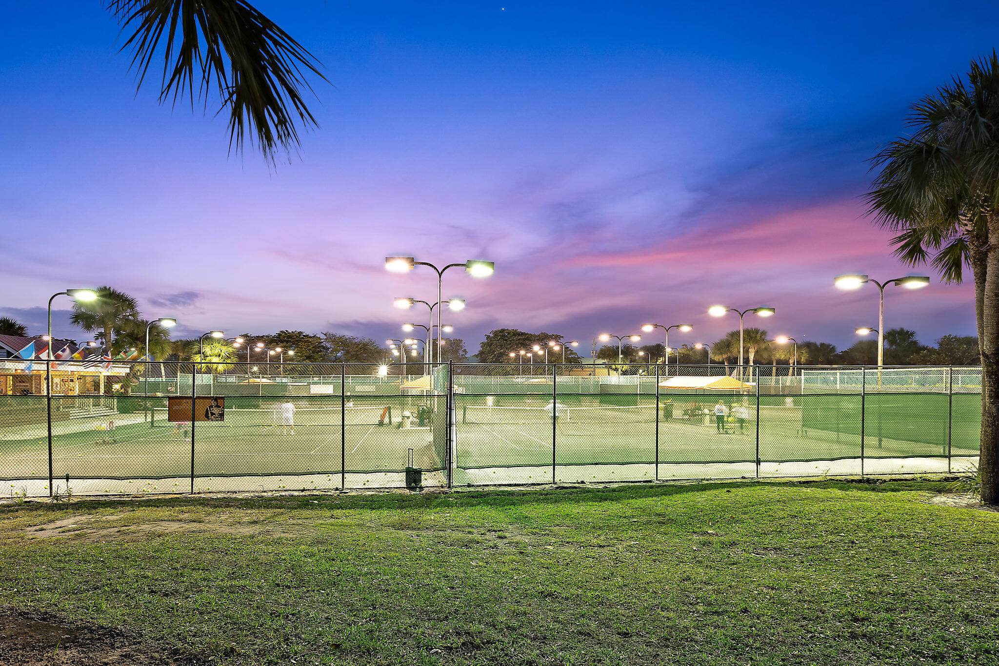 353 Highway 1, Unit B301 Jupiter, FL 33477 - Photo 54 of 58 a view of a golf course with a lake